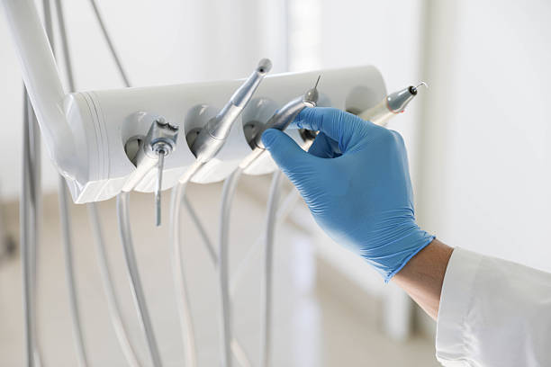 Professional Emergency Dentist technician working in Gentry, AR